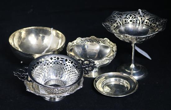 Three various pierced silver bon bon dishes, two other small dishes and a South American white metal bowl